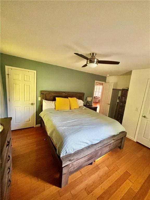 1430 W Main St, West Union, SC 29696 - bedroom featuring wood finished floors and ceiling fan