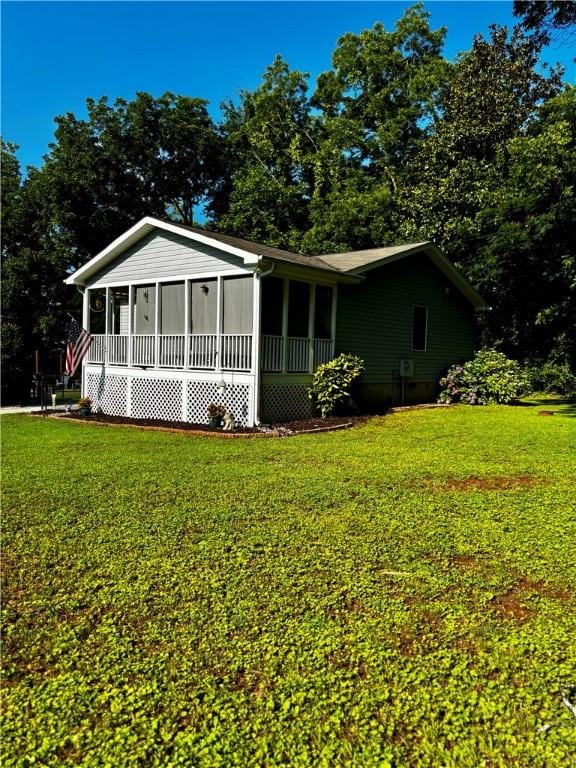 1430 W Main St, West Union, SC 29696 - view of front of house with a front lawn and a sunroom