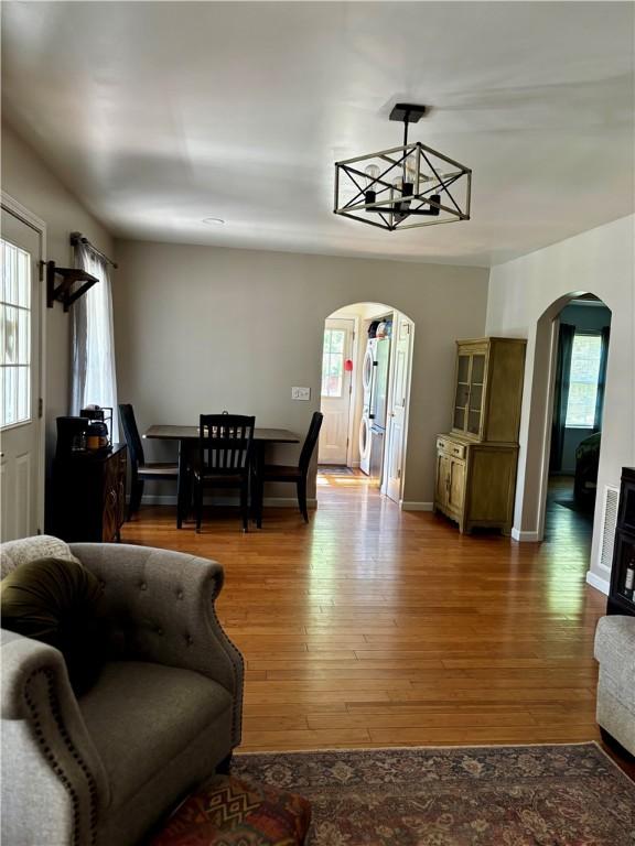 1430 W Main St, West Union, SC 29696 - living room featuring arched walkways and wood finished floors