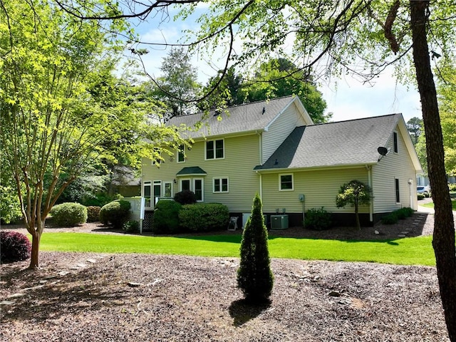 210 Wakefield Dr, Seneca, SC 29678 - rear view of property featuring a yard and roof with shingles