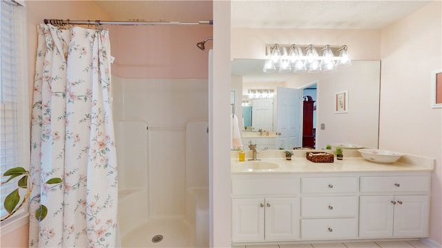 210 Wakefield Dr, Seneca, SC 29678 - bathroom featuring a shower with shower curtain and double vanity