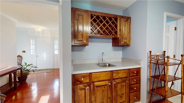 210 Wakefield Dr, Seneca, SC 29678 - kitchen with light countertops, brown cabinetry, and dark wood-style floors