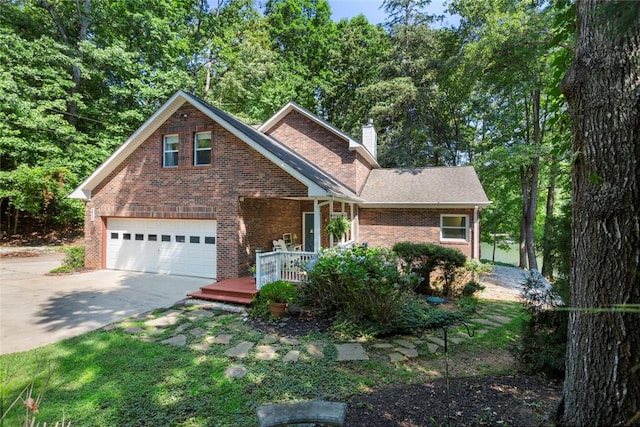 200 Mullins Ford Landing Rd, Westminster, SC 29693 - traditional-style house with driveway, brick siding, a chimney, and a garage