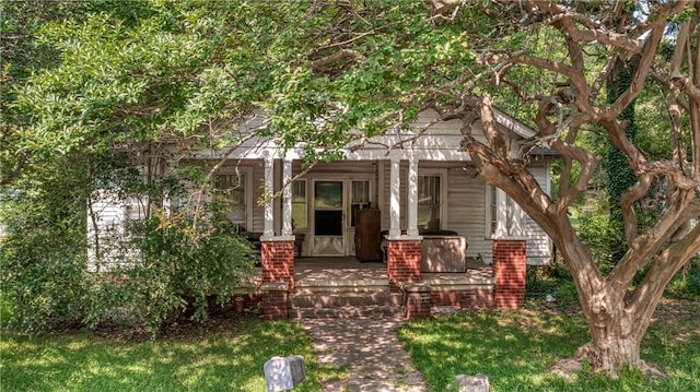1212 W End Ave, Anderson, SC 29625 - doorway to property with a porch and a lawn