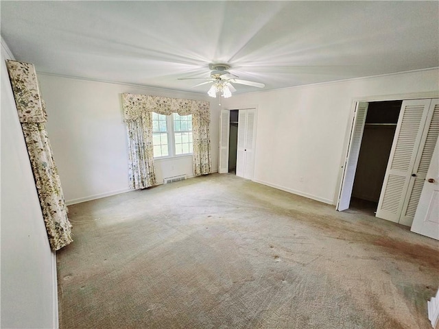150 Prater Dr, Seneca, SC 29678 - unfurnished bedroom with multiple closets, carpet, and ceiling fan