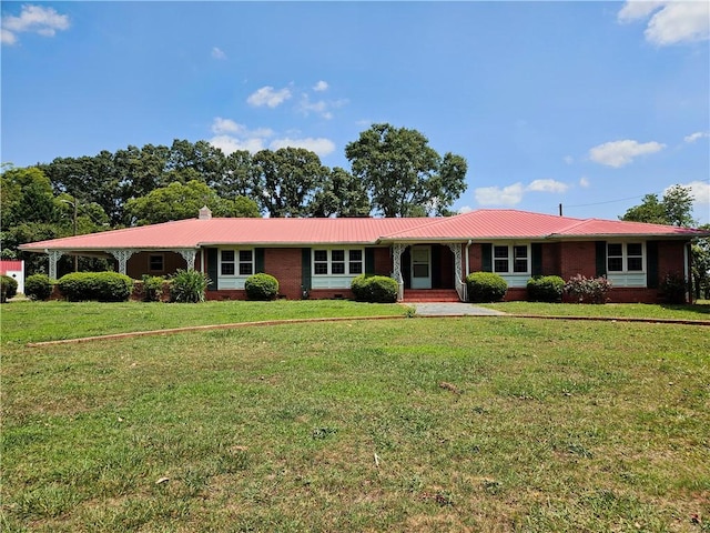150 Prater Dr, Seneca, SC 29678 - ranch-style house with a metal roof, a front lawn, and brick siding