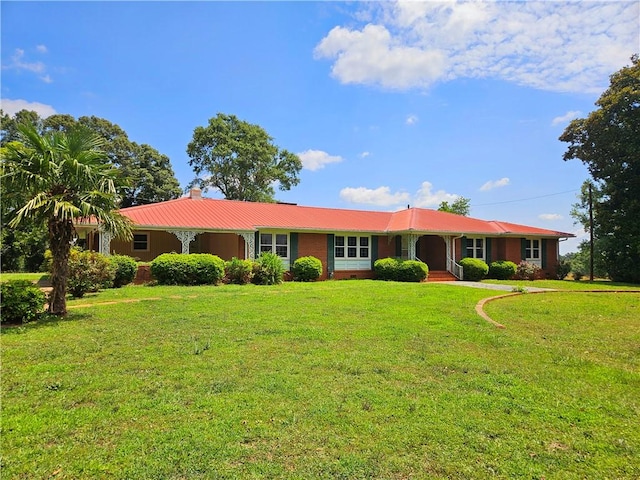 150 Prater Dr, Seneca, SC 29678 - ranch-style home featuring a chimney, a front lawn, and a metal roof