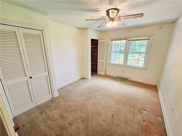 150 Prater Dr, Seneca, SC 29678 - unfurnished bedroom featuring carpet floors, two closets, ornamental molding, and a ceiling fan