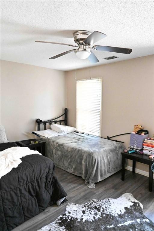 343 Old Greenville Hwy Unit 5, Clemson, SC 29631 - bedroom featuring a textured ceiling, wood finished floors, and ceiling fan