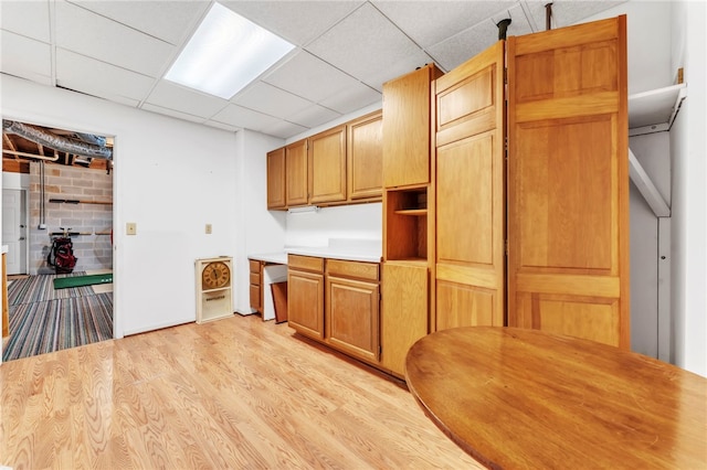 4 Slack Tide Ct, Salem, SC 29676 - kitchen featuring light wood-type flooring, light countertops, and a drop ceiling