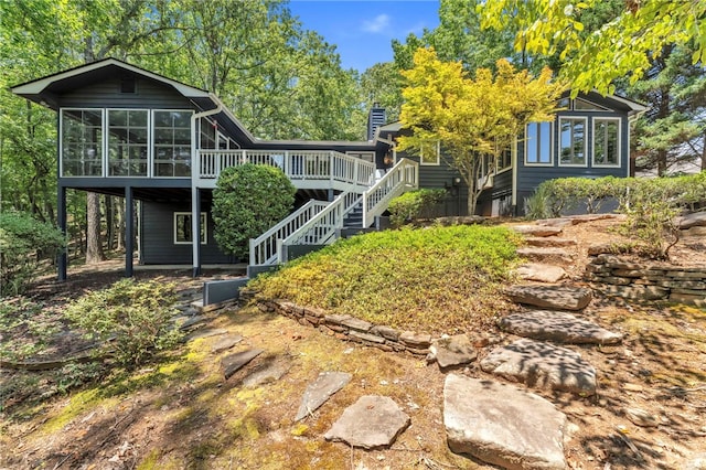 4 Slack Tide Ct, Salem, SC 29676 - back of house featuring a deck, stairway, a sunroom, and a chimney