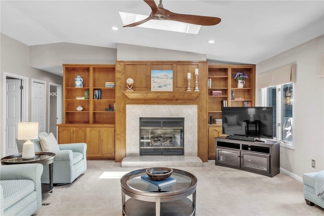 4 Slack Tide Ct, Salem, SC 29676 - living area with vaulted ceiling, a skylight, light colored carpet, ceiling fan, and a fireplace