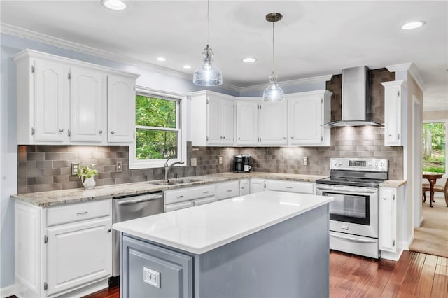 4 Slack Tide Ct, Salem, SC 29676 - kitchen featuring electric range, wall chimney exhaust hood, dark wood-type flooring, white cabinetry, and a kitchen island