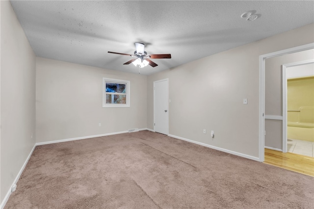 4214 Hembree Creek Rd, Anderson, SC 29625 - carpeted spare room featuring a ceiling fan and a textured ceiling
