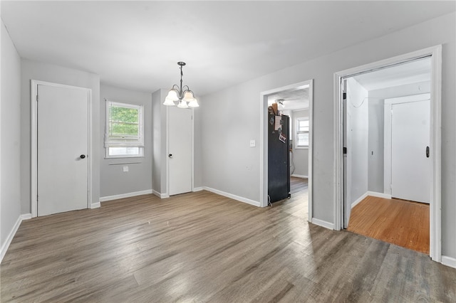 805 Cooley Bridge Rd, Pelzer, SC 29669 - unfurnished dining area with wood finished floors and a chandelier