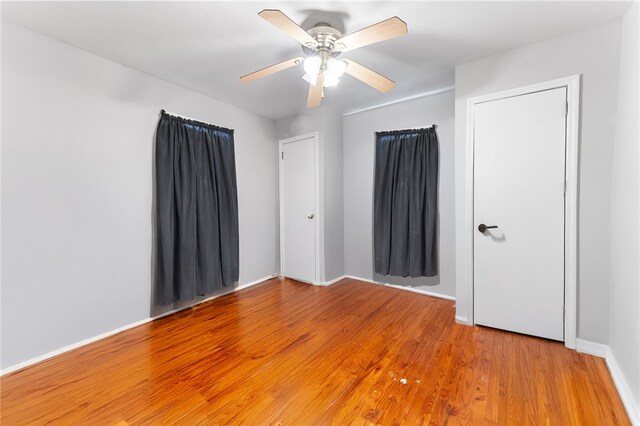 805 Cooley Bridge Rd, Pelzer, SC 29669 - empty room with light wood finished floors and a ceiling fan