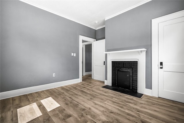 104 W Franklin St, Anderson, SC 29624 - unfurnished living room with ornamental molding, a fireplace with flush hearth, and wood finished floors