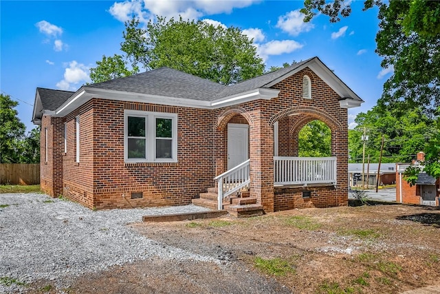 104 W Franklin St, Anderson, SC 29624 - view of front of house featuring crawl space, brick siding, and roof with shingles
