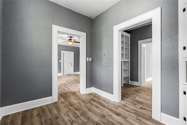 104 W Franklin St, Anderson, SC 29624 - corridor with wood finished floors and electric panel