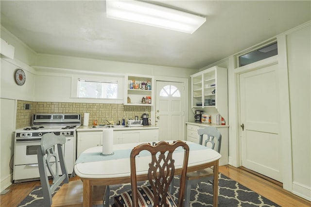 200 W N 1st St, Seneca, SC 29678 - dining space with wood finished floors and plenty of natural light