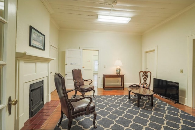 200 W N 1st St, Seneca, SC 29678 - sitting room featuring a fireplace with flush hearth, dark wood-type flooring, and crown molding