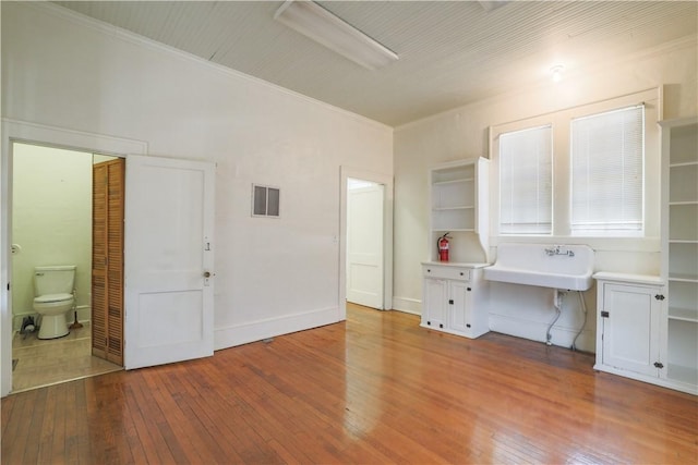 200 W N 1st St, Seneca, SC 29678 - unfurnished office featuring hardwood / wood-style flooring and crown molding