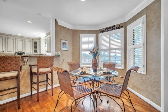 105 Wren Crossing Ct, Easley, SC 29642 - dining area with plenty of natural light, light wood-style floors, crown molding, and recessed lighting