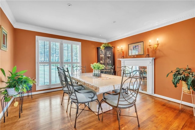 105 Wren Crossing Ct, Easley, SC 29642 - dining area with light wood-style floors and crown molding