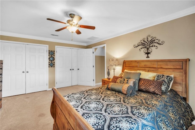 105 Wren Crossing Ct, Easley, SC 29642 - carpeted bedroom with two closets, ceiling fan, and crown molding