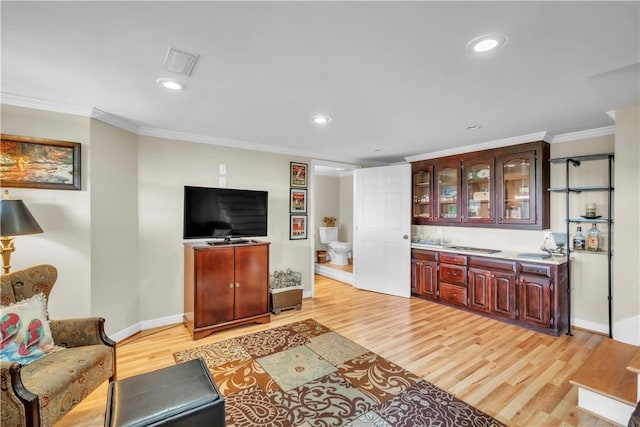 105 Wren Crossing Ct, Easley, SC 29642 - living room featuring light wood-style flooring, ornamental molding, and recessed lighting