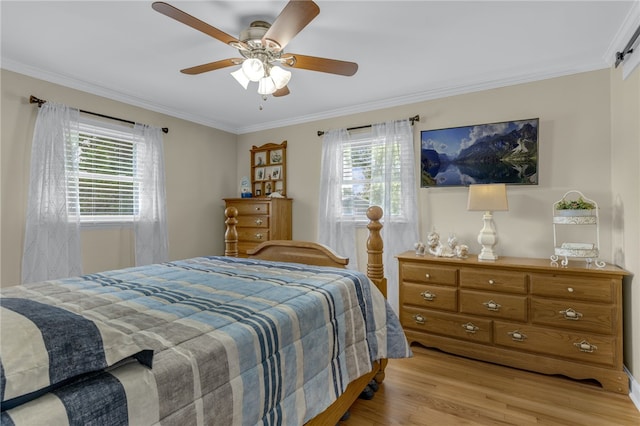 701 Durham Brown Rd, Seneca, SC 29678 - bedroom with multiple windows, light wood-style floors, ornamental molding, and ceiling fan