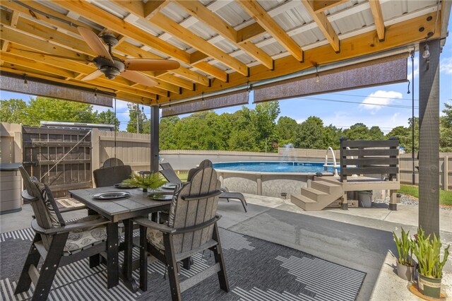701 Durham Brown Rd, Seneca, SC 29678 - fenced backyard with outdoor dining area, a patio area, and a ceiling fan