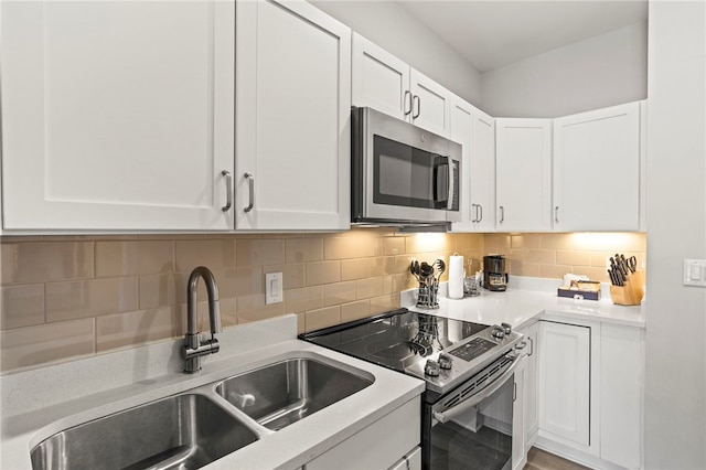 13500 Clemson Blvd Unit 2225A, Seneca, SC 29678 - kitchen featuring appliances with stainless steel finishes, white cabinets, light countertops, and tasteful backsplash