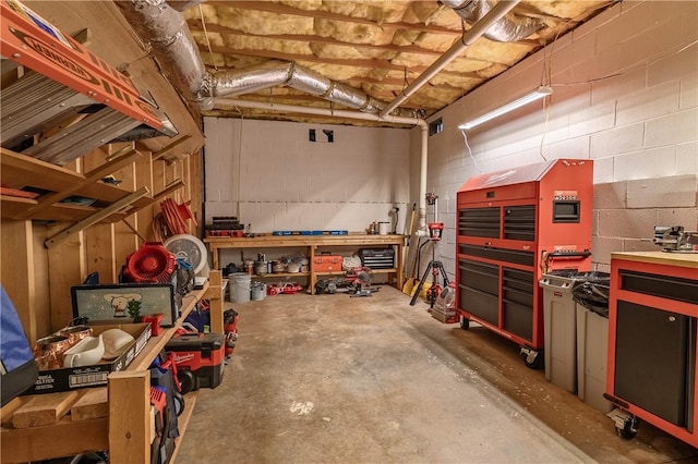 2713 Leconte Rd, Anderson, SC 29621 - garage featuring a workshop area and concrete block wall