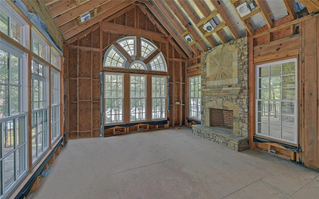 210 Rosewood Cir, Hartwell, GA 30643 - unfurnished living room featuring a fireplace and high vaulted ceiling