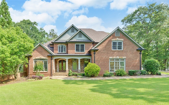 210 Rosewood Cir, Hartwell, GA 30643 - view of front of house with brick siding, a front yard, and covered porch