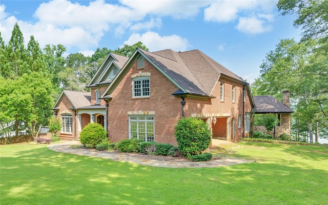 210 Rosewood Cir, Hartwell, GA 30643 - view of front facade with a front yard, a chimney, and brick siding