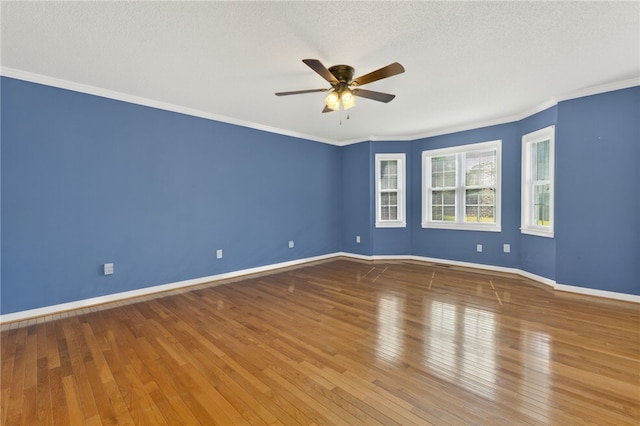 100 Hidden Creek Dr, Easley, SC 29642 - unfurnished room featuring ceiling fan, hardwood / wood-style flooring, crown molding, and a textured ceiling