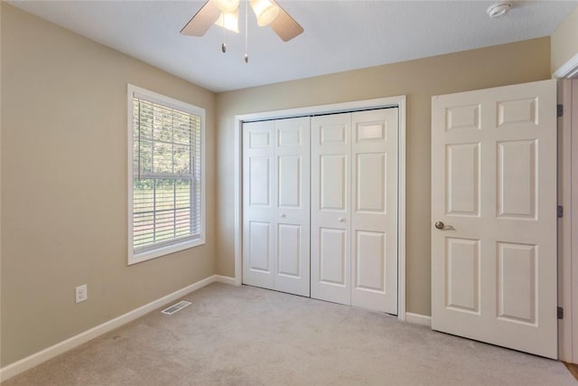 518 Pecan Grove Rd, Seneca, SC 29672 - unfurnished bedroom with light carpet, a closet, and ceiling fan
