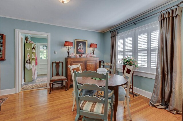 118 Glenwood Ave, Anderson, SC 29625 - dining space featuring ornamental molding and light wood-style flooring