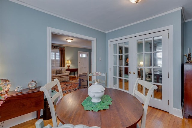 118 Glenwood Ave, Anderson, SC 29625 - dining room featuring french doors, ornamental molding, and light wood finished floors