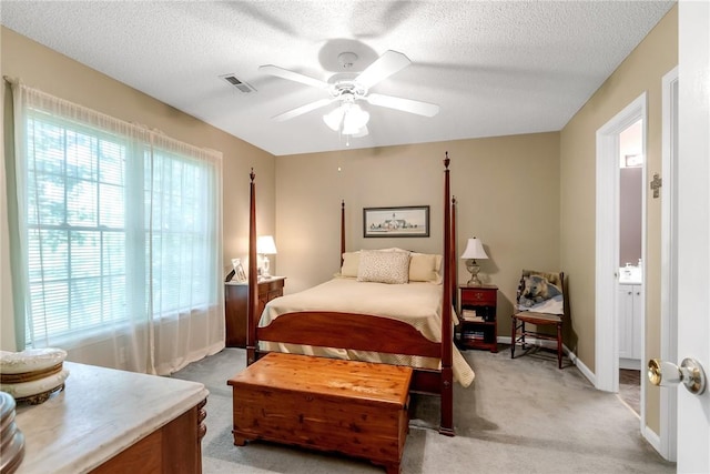 118 Grand Oak Cir, Pendleton, SC 29670 - bedroom with light colored carpet, a textured ceiling, ceiling fan, and connected bathroom