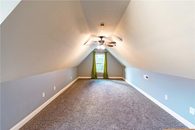 2444 Poole Rd, Greer, SC 29650 - additional living space featuring a ceiling fan, vaulted ceiling, carpet flooring, and a textured ceiling