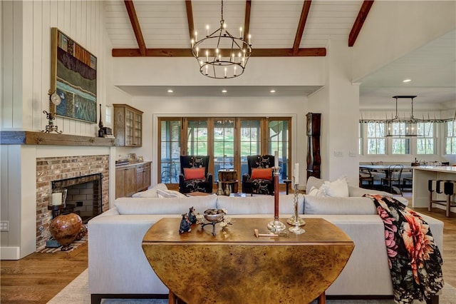 LOT10 Laurel Pond Way, Sunset, SC 29685 - living room with a chandelier, wood finished floors, and a fireplace