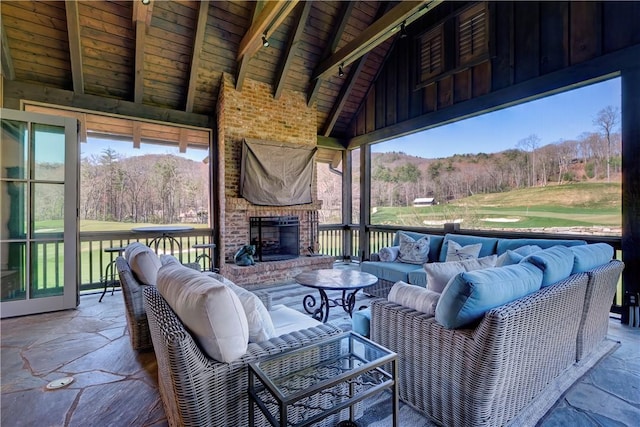 LOT10 Laurel Pond Way, Sunset, SC 29685 - view of patio / terrace with an outdoor living space with a fireplace and a forest view