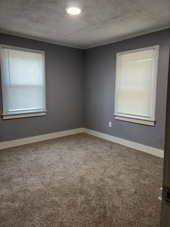 715 Delia St, Anderson, SC 29624 - unfurnished room featuring carpet floors and a textured ceiling