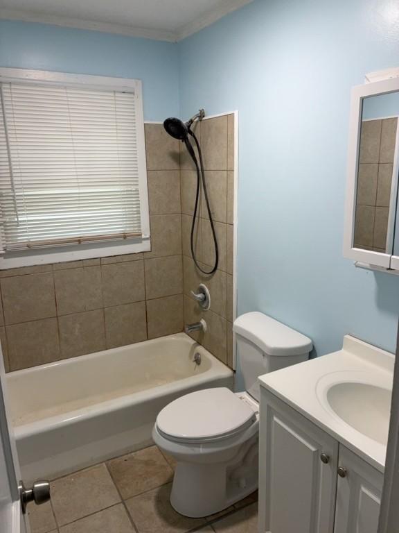 715 Delia St, Anderson, SC 29624 - full bathroom featuring vanity, shower / bathtub combination, tile patterned floors, and crown molding