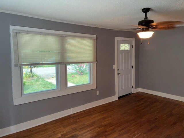 715 Delia St, Anderson, SC 29624 - foyer featuring ceiling fan, dark wood-style flooring, and crown molding