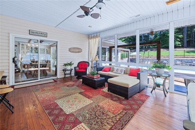 308 Amethyst Way, Seneca, SC 29672 - sunroom / solarium with hardwood / wood-style flooring, ceiling fan, a deck, outdoor lounge area, and wooden walls