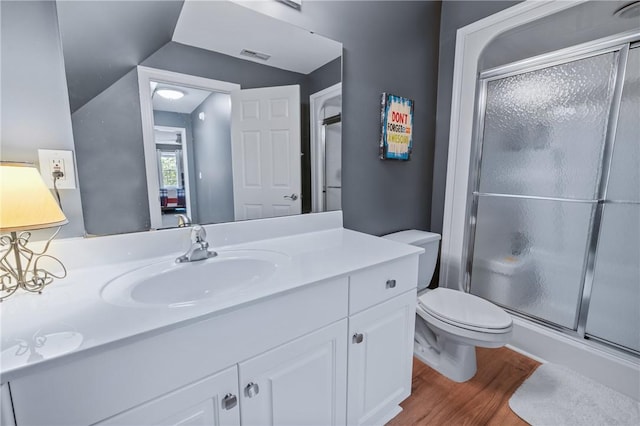 308 Amethyst Way, Seneca, SC 29672 - bathroom featuring vanity, a shower stall, and wood finished floors